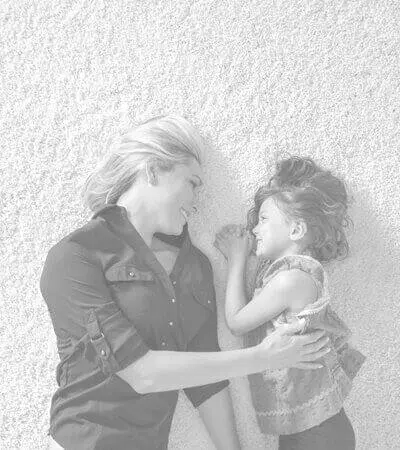 mother and daughter on freshly cleaned carpet from willing and able carpet cleaning